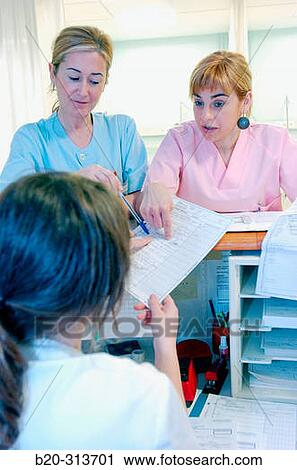 Stock Image - Boxes and control desk at hospital. Fotosearch