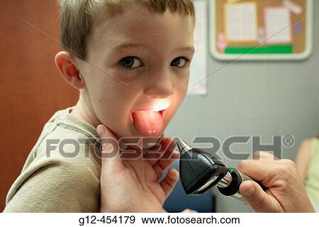 Boy, age 5, having medical check up at hospital. View Large Photo Image Stock Photo - Boy, age 5, having medical check up at hospital.. Fotosearch