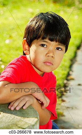 Stock Photo - Boy amusing himself. Laguna Beach. California. USA. Fotosearch