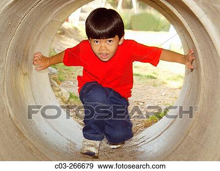 Stock Photo - Boy amusing himself. Laguna Beach. California. USA. Fotosearch