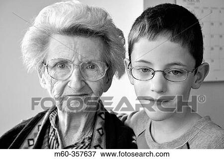 Boy and elderly lady View Large Photo Image Stock Photo - Boy and elderly lady. Fotosearch