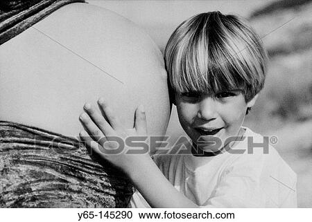 Boy and pregnant mother View Large Photo Image Stock Image - Boy and pregnant mother. Fotosearch