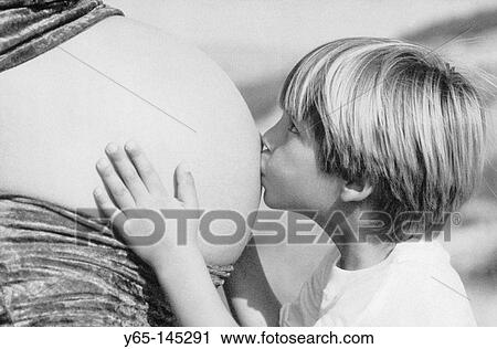 Boy and pregnant mother View Large Photo Image Stock Image - Boy and pregnant mother. Fotosearch