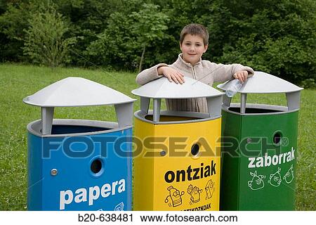 Boy by recycling containers. Legazpi, Guipuzcoa, Euskadi, Spain View Large Photo Image Stock Image - Boy by recycling containers. Legazpi, Guipuzcoa, Euskadi, Spain. Fotosearch