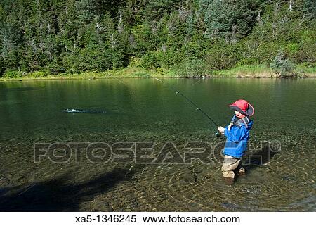 Boy catching a Silver Salmon, Shrode Lake, Prince William Sound, Alaska, USA View Large Photo Image Stock Photography - Boy catching a Silver Salmon, Shrode Lake, Prince William Sound, Alaska, USA. Fotosearch