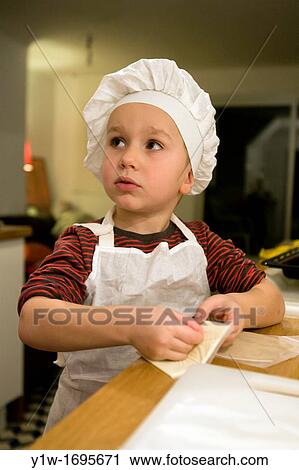 Boy cooking View Large Photo Image Stock Image - Boy cooking. Fotosearch