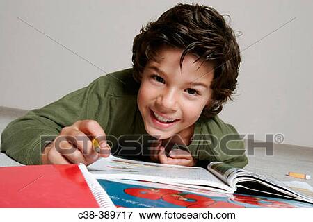Boy Doing Homework View Large Photo Image Stock Photo - Boy Doing Homework. Fotosearch