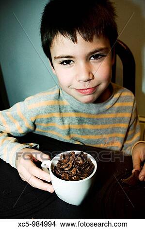 Boy eating View Large Photo Image Picture - Boy eating. Fotosearch