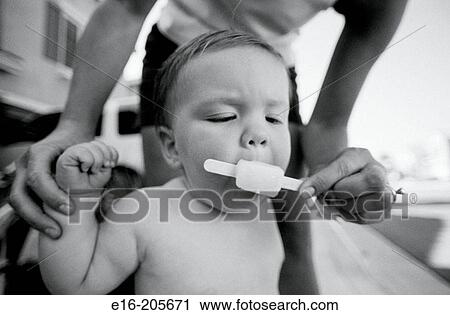 boy eating popsicle View Large Photo Image Stock Image - boy eating popsicle. Fotosearch