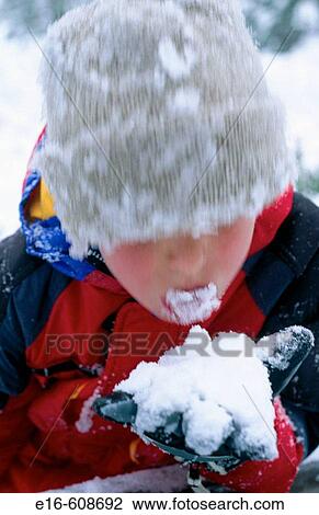 Boy eating snow View Large Photo Image Stock Image - Boy eating snow. Fotosearch