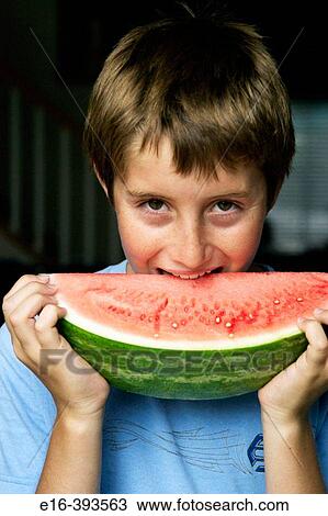 boy eating watermelon View Large Photo Image Stock Image - boy eating watermelon. Fotosearch