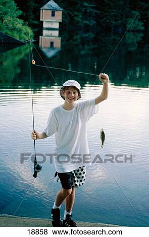Boy fishing View Large Photo Image Stock Photo - Boy fishing. Fotosearch