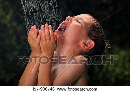 boy having shower outdoors, Switzerland View Large Photo Image Stock Image - boy having shower outdoors, Switzerland. Fotosearch