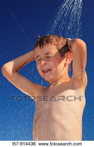 boy having shower outdoors, Switzerland View Large Photo Image Stock Photograph - boy having shower outdoors, Switzerland. Fotosearch