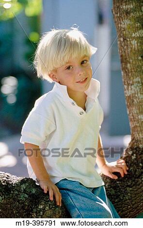 boy in a tree View Large Photo Image Stock Image - boy in a tree. Fotosearch