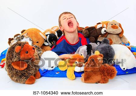 boy in bed with toy animals, studio, Oetwil am See, Zuerich, Switzerland View Large Photo Image Stock Image - boy in bed with toy animals, studio, Oetwil am See, Zuerich, Switzerland. Fotosearch