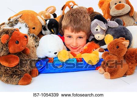 boy in bed with toy animals, studio, Oetwil am See, Zuerich, Switzerland View Large Photo Image Stock Photo - boy in bed with toy animals, studio, Oetwil am See, Zuerich, Switzerland. Fotosearch