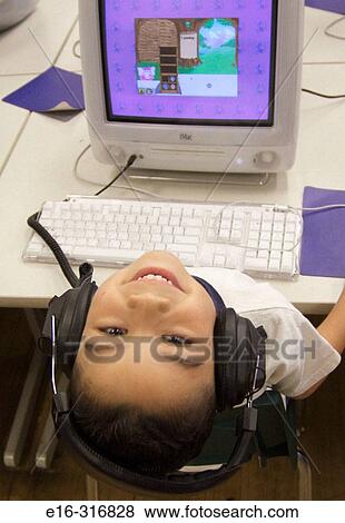 boy in computer lab View Large Photo Image Stock Photo - boy in computer lab. Fotosearch