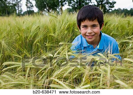 Boy in grain field. Arkaute, Alava, Euskadi, Spain View Large Photo Image Stock Image - Boy in grain field. Arkaute, Alava, Euskadi, Spain. Fotosearch