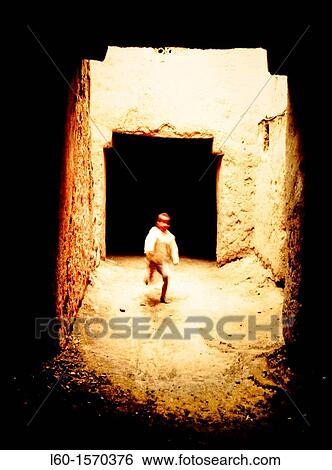 Boy in Kasbah, Sud of Morocco View Large Photo Image Stock Photograph - Boy in Kasbah, Sud of Morocco. Fotosearch