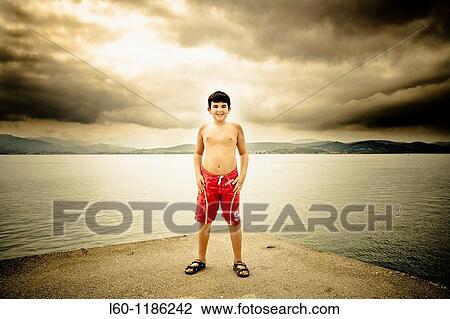 Stock Image - Boy in Santoa, Cantabria, Spain. Fotosearch