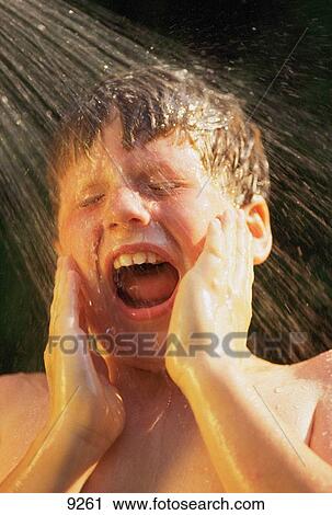 Boy in shower View Large Photo Image Stock Image - Boy in shower. Fotosearch
