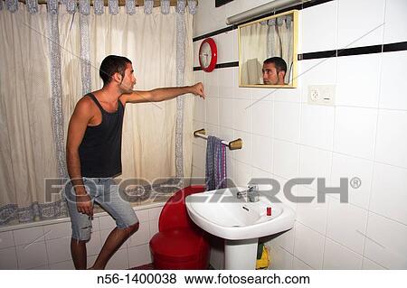 Boy in the toilet View Large Photo Image Stock Photo - Boy in the toilet. Fotosearch