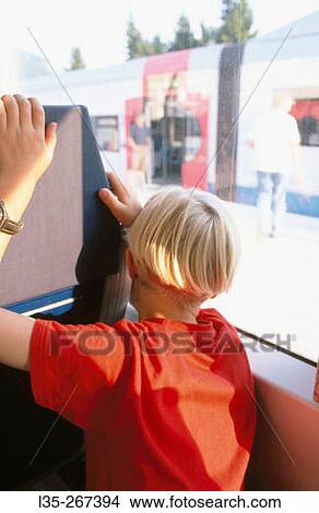 Boy in train View Large Photo Image Picture - Boy in train. Fotosearch
