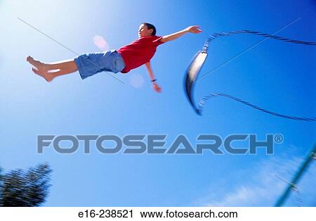 boy jumping from swing View Large Photo Image Stock Image - boy jumping from swing. Fotosearch