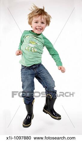 Boy jumping View Large Photo Image Stock Image - Boy jumping. Fotosearch