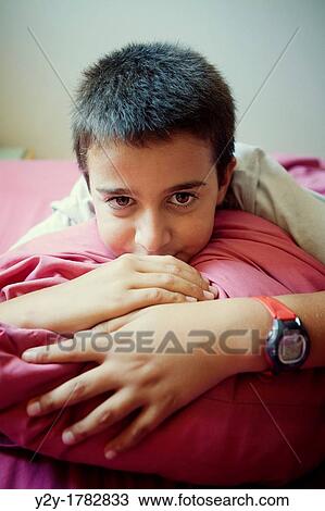 Boy looking at the camera View Large Photo Image Stock Image - Boy looking at the camera. Fotosearch