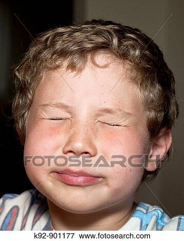 Boy making a funny face View Large Photo Image Stock Photo - Boy making a funny face. Fotosearch