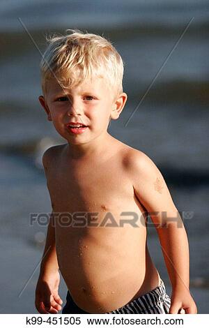 Boy on beach View Large Photo Image Stock Photography - Boy on beach. Fotosearch