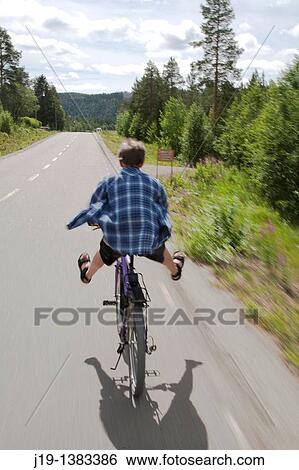 Boy on bike. North of Sweden View Large Photo Image Stock Photograph - Boy on bike. North of Sweden. Fotosearch