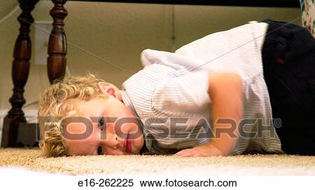 Boy on floor View Large Photo Image Stock Photography - Boy on floor. Fotosearch