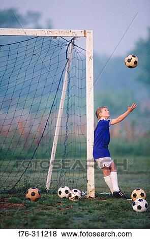 Boy on soccer filed. Charlotte. North Carolina. USA. View Large Photo Image Stock Photo - Boy on soccer filed. Charlotte. North Carolina. USA.. Fotosearch