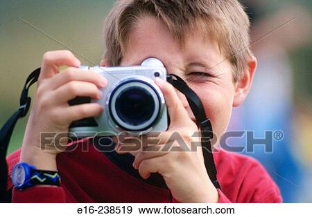 boy photographing View Large Photo Image Stock Photo - boy photographing. Fotosearch