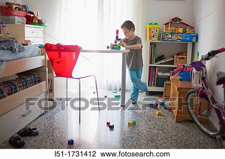boy playing in his bedroom, Valencia, Spain View Large Photo Image Stock Image - boy playing in his bedroom, Valencia, Spain. Fotosearch