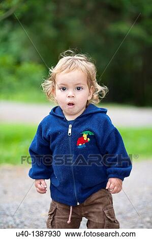 Boy playing in the woods View Large Photo Image Stock Image - Boy playing in the woods. Fotosearch