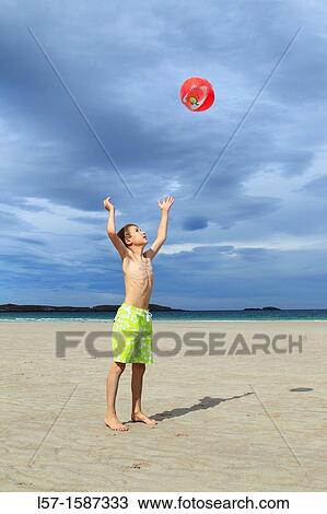 boy playing on sandy beach, Sutherland, Scotland View Large Photo Image Stock Image - boy playing on sandy beach, Sutherland, Scotland. Fotosearch
