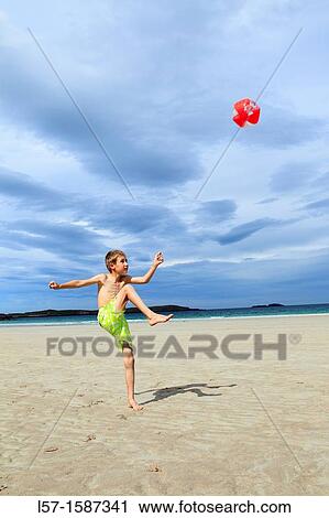 boy playing on sandy beach, Sutherland, Scotland View Large Photo Image Stock Image - boy playing on sandy beach, Sutherland, Scotland. Fotosearch