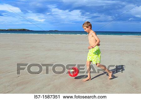 boy playing on sandy beach, Sutherland, Scotland View Large Photo Image Stock Image - boy playing on sandy beach, Sutherland, Scotland. Fotosearch