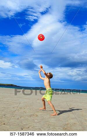 boy playing on sandy beach, Sutherland, Scotland View Large Photo Image Stock Photograph - boy playing on sandy beach, Sutherland, Scotland. Fotosearch