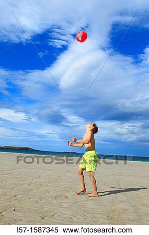 boy playing on sandy beach, Sutherland, Scotland View Large Photo Image Stock Photography - boy playing on sandy beach, Sutherland, Scotland. Fotosearch