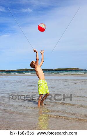 boy playing on sandy beach, Sutherland, Scotland View Large Photo Image Stock Photography - boy playing on sandy beach, Sutherland, Scotland. Fotosearch