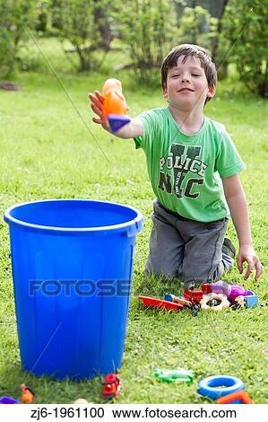 Boy playing outdoor. View Large Photo Image Stock Image - Boy playing outdoor.. Fotosearch