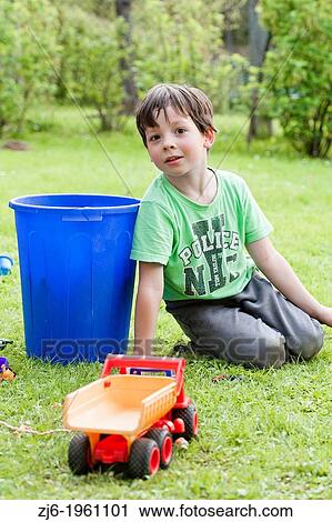 Boy playing outdoor. View Large Photo Image Stock Image - Boy playing outdoor.. Fotosearch