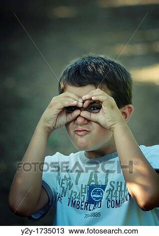 Boy playing with the camera View Large Photo Image Stock Image - Boy playing with the camera. Fotosearch