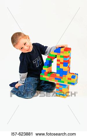 boy playing with toy, Lego, on his fourth birthday, Studio, Oetwil am See, Zuerich, Switzerland, View Large Photo Image Stock Image - boy playing with toy, Lego, on his fourth birthday, Studio, Oetwil am See, Zuerich, Switzerland,. Fotosearch