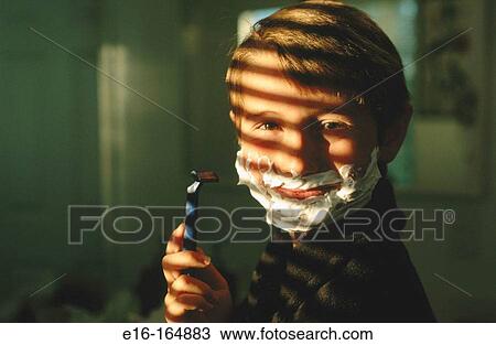 Boy pretending to shave View Large Photo Image Stock Image - Boy pretending to shave. Fotosearch